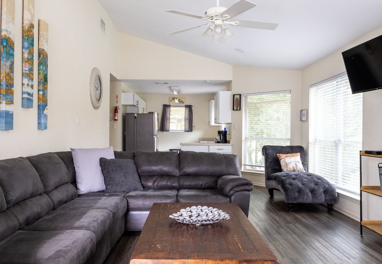 Cozy living room with plush seating and river-themed décor