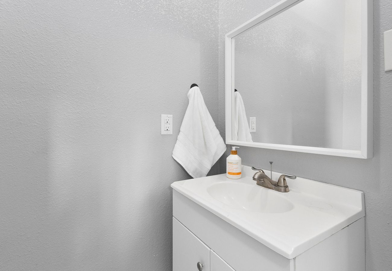 family friendly, historic home, Seguin vacation rental half bath white fixtures clean towels practical space