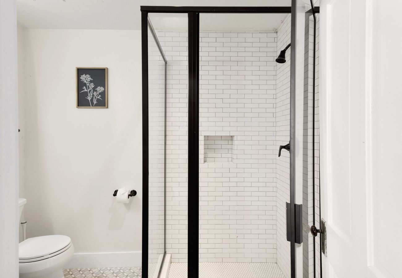 Full bathroom on main level of Bowie Grand